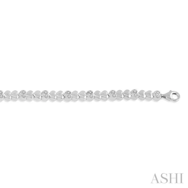 1/6 ctw Puffed Heart Plain and Round Cut Diamond Fashion Bracelet in Sterling Silver