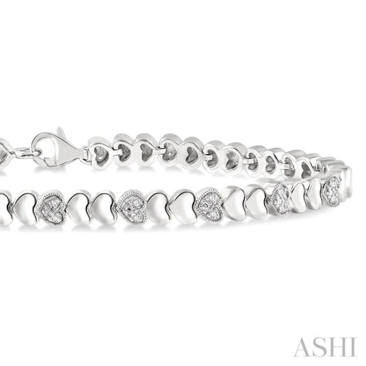 1/6 ctw Puffed Heart Plain and Round Cut Diamond Fashion Bracelet in Sterling Silver
