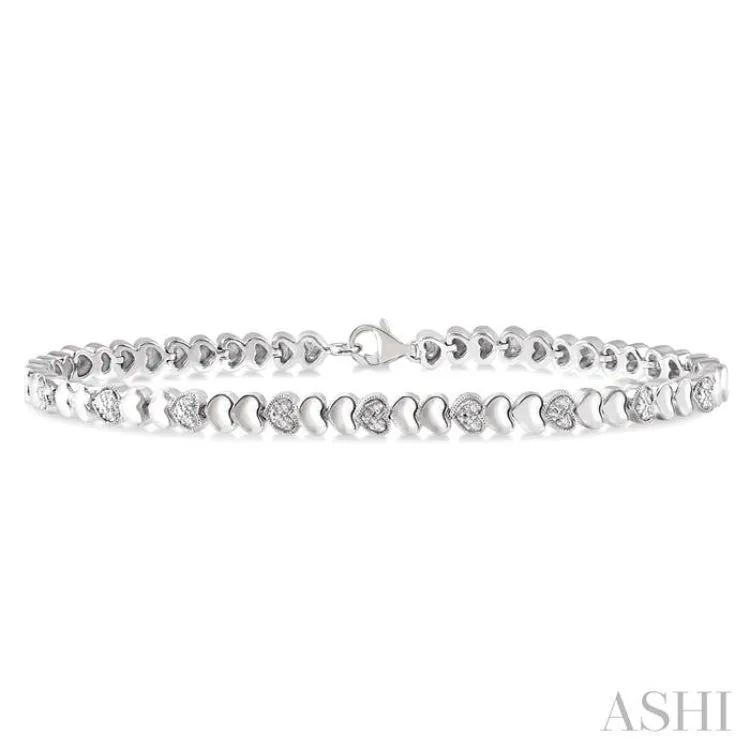1/6 ctw Puffed Heart Plain and Round Cut Diamond Fashion Bracelet in Sterling Silver