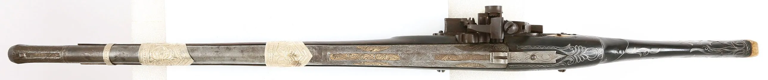 A FINE AND RARE ARAB SNAPHAUNCE JEZAIL CARBINE. C.1859